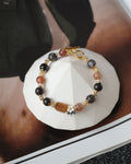 *Luna&Lithoss* Cocoa - 8mm Garden Quartz, Black Gold Skeletal Sunstone and Black Gold Super 7 w Bouquet & OT Clasp