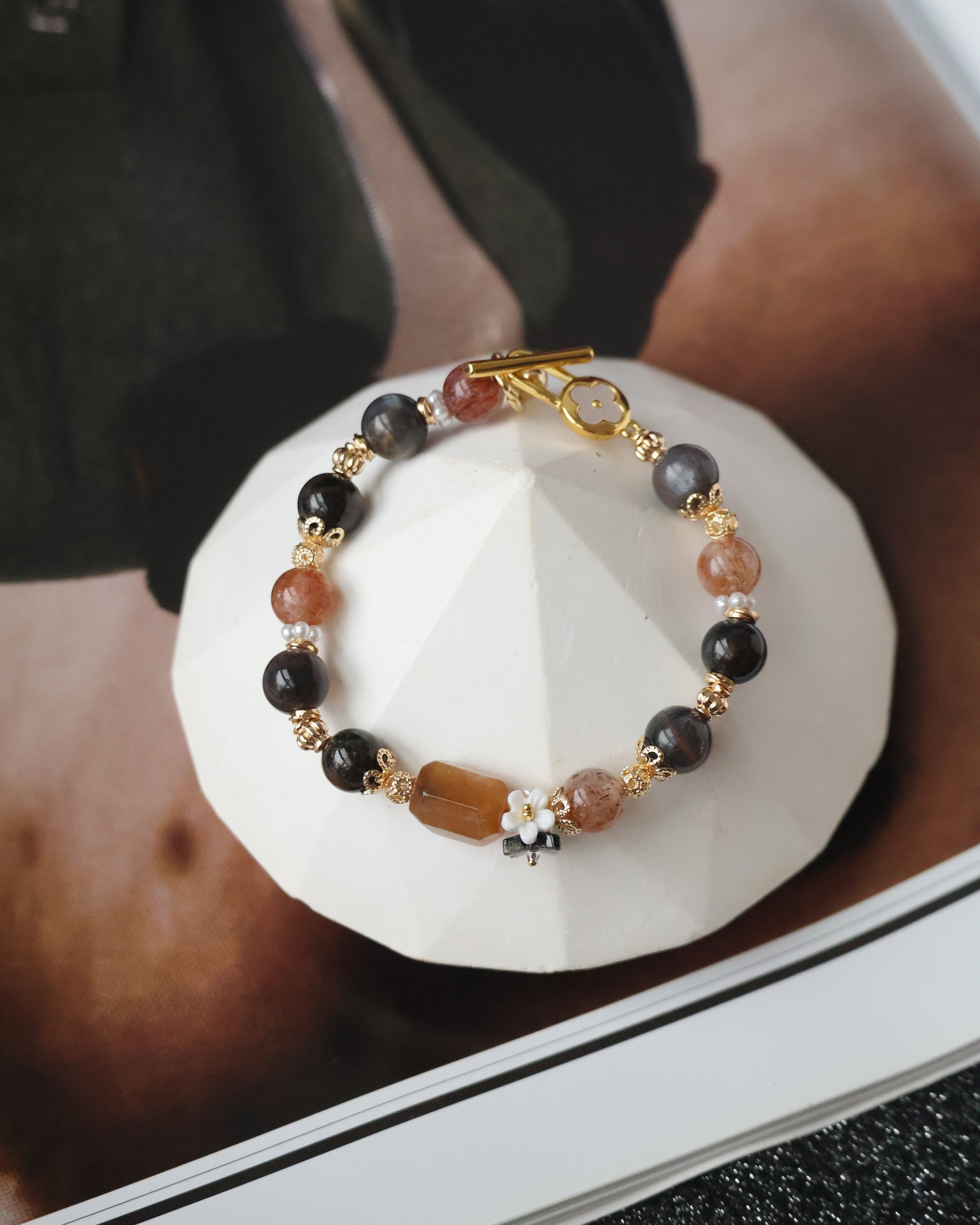 *Luna&Lithoss* Cocoa - 8mm Garden Quartz, Black Gold Skeletal Sunstone and Black Gold Super 7 w Bouquet & OT Clasp