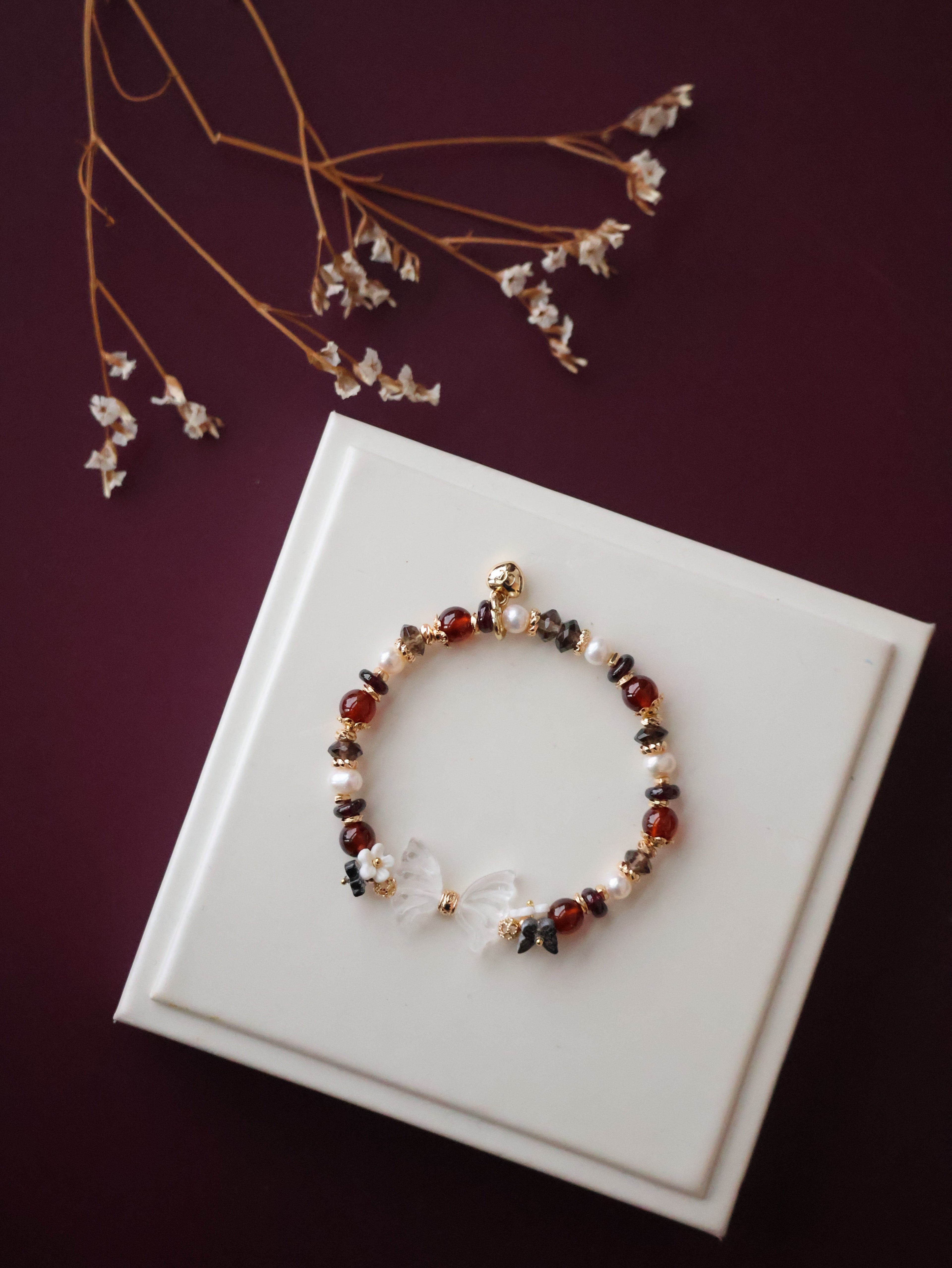 *Luna&Lithoss*  - Erza - 6mm Smoky Quartz, Fresh Water Pearls & Garnet with Clear Quartz Wings Carving (Elastic)
