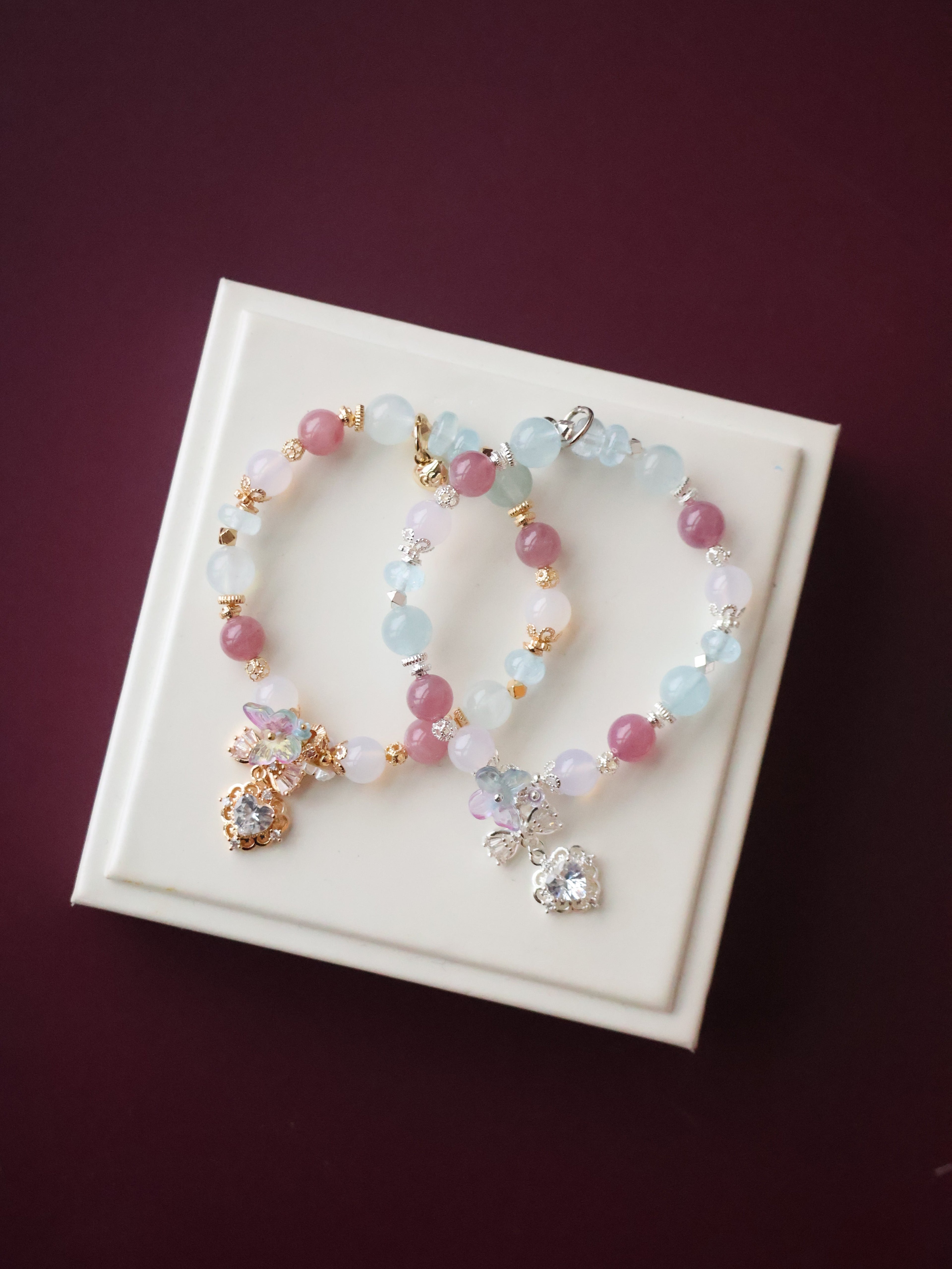 *Luna&Lithoss*  -  Blossara - 8mm Blue Topaz, Aquamarine, Lilac Chalcedony & Lavender Rose Quartz with Dangly Sparkly Heart and Butterfly Rainbow Charm (Elastic)