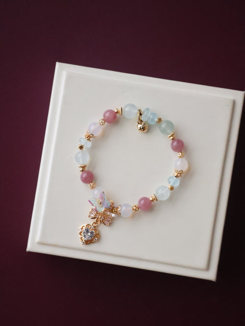 *Luna&Lithoss*  -  Blossara - 8mm Blue Topaz, Aquamarine, Lilac Chalcedony & Lavender Rose Quartz with Dangly Sparkly Heart and Butterfly Rainbow Charm (Elastic)