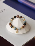 Black Obsidian, Black Gold Super 7, Devil Blue Aquamarine & Wuji Jadeite Crystal Bracelet with Clover Charm ¡ª The Luxe Edit | 10mm (Elastic)